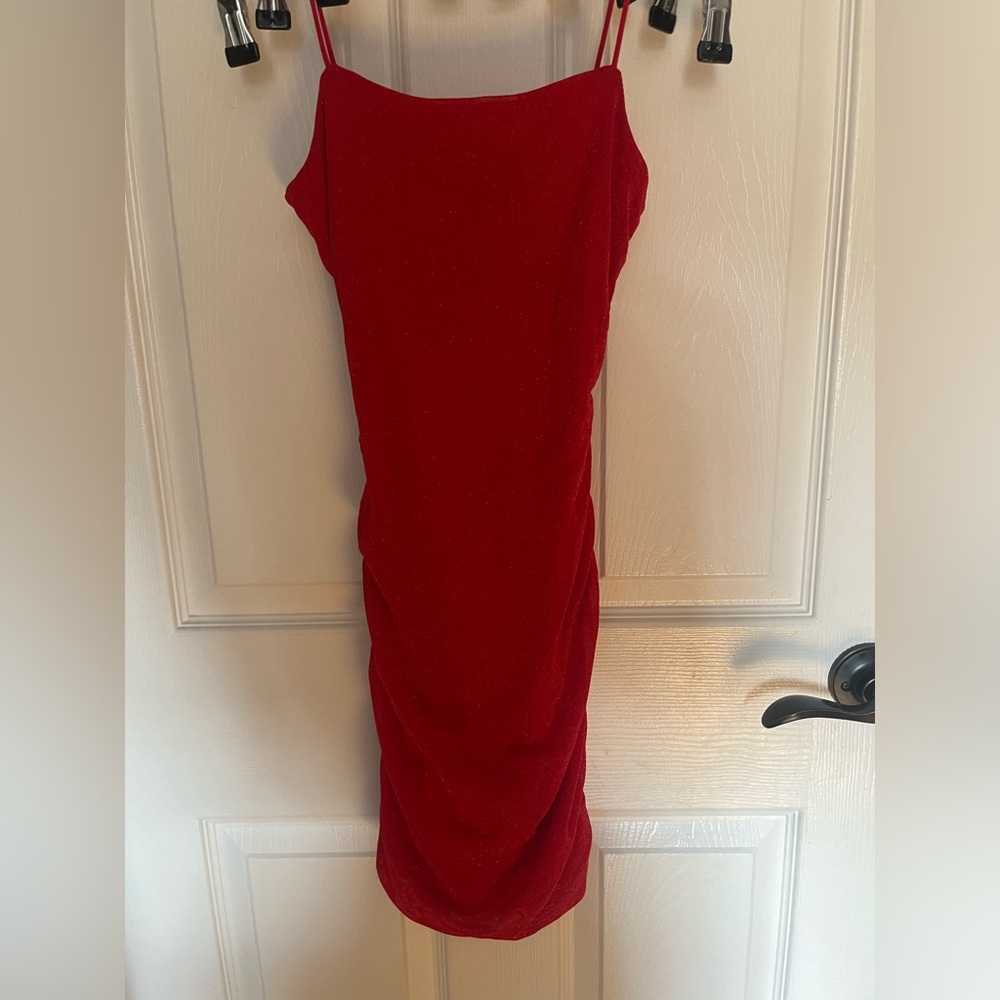 Open back red body con dress